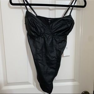 Black leather bodysuit
